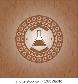 test tube icon inside retro wood emblem