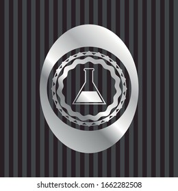 test tube icon inside silvery emblem