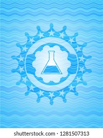 test tube icon inside sky blue water wave badge.