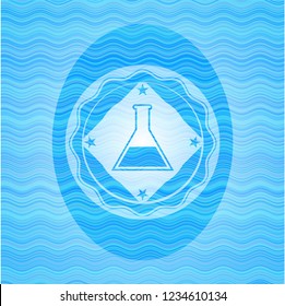 test tube icon inside water wave representation style badge.