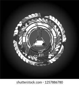 test tube icon on grey camouflage texture