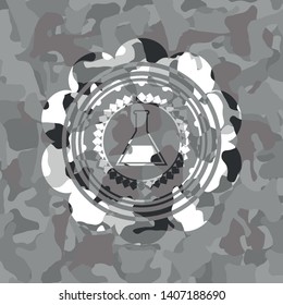 test tube icon on grey camo texture