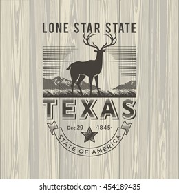 Texas Lone star state, a stylized emblem of the state of America, deer, on wooden background