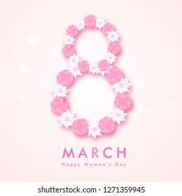 Text 8 made by paper cut flowers on glossy pink background. Can be used as greeting card design.