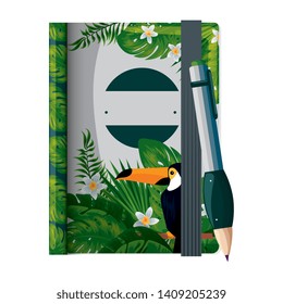 text book and pen writing with tropical print
