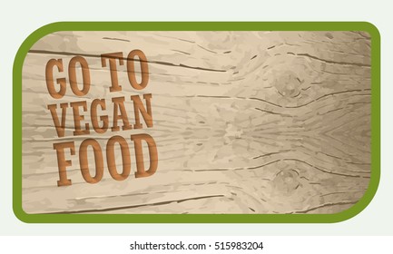 A text box for your text and wooden background and the words go to vegan food