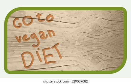 A text box for your text and wooden background and hand written words go to vegan diet