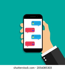 Text chat in mobile phone. Bubble message in cellphone. Hand holding smartphone with chat between two person. Sms notification on screen. App for online speech and talk. Vector.
