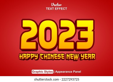 text effect happy chinese new year 2023 with graphic style and editable.
