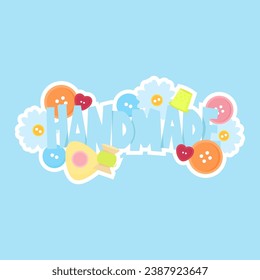 Text handmade with buttons and sewing tools on blue background