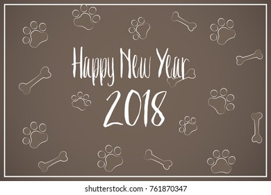 The text of the happy new year 2018 on the background of the dog tracks and bone. Vector