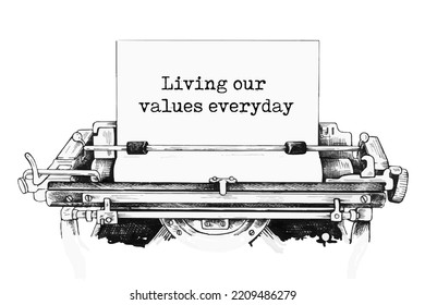 Text 'Living our values everyday' typed on retro typewriter.