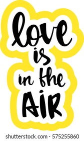 text - ''love is in the air'' Modern brush calligraphy. Isolated on white background. Hand drawn lettering element for prints, cards, posters, products packaging, branding.