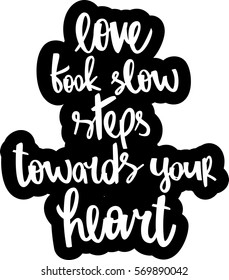 text - ''love took slow steps towards your heart'' Modern brush calligraphy. Isolated on white background. Hand drawn lettering element for prints, cards, posters, products packaging, branding.