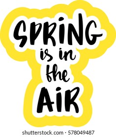 text - ''spring is in the air'' Modern brush calligraphy. Isolated on white background. Hand drawn lettering element for prints, cards, posters, products packaging, branding.