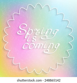 Text "Spring is coming" on blurred background with texture