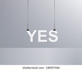 text yes is suspended on a rope