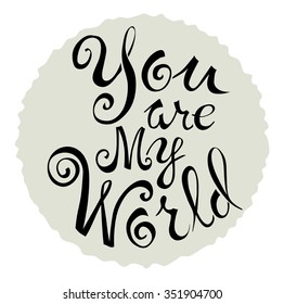 Text of You are my world, on a gray circle