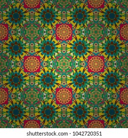 Textile fabric paper print. Vector patchwork quilt pattern. Colorful seamless pattern in mosaic style. Oriental ethnic ornament in yellow, blue and green colors. Stylized floral doodle background.
