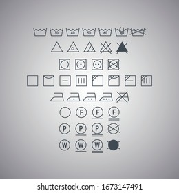 Textile laundry symbol set isolated on gray background. Rules for processing products. Vector illustration.