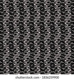 Textile material, possibly made of wool, with a striped pattern marked here and there with obvious dots and short lines. Graphics in black and white.