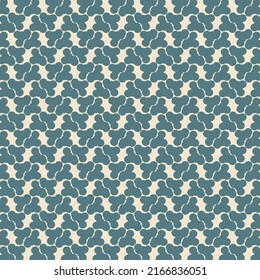 Textile pattern made of small blue shapes, rounded and branched, arranged on a pinkish white. Wallpaper design.