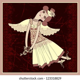 Textile Tilda doll with angel wings in the cylinder.
