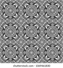 For textile, wallpaper, wrapping paper. Ethnic theme. Hand drawn seamless pattern. Zigzag and stripe line, rhombus and tiles. Vector tribal design in white, gray and black colors.