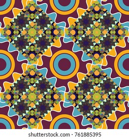 For textile, wallpaper, wrapping paper. Vector tribal design in yellow, blue and purple colors. Ethnic theme. Zigzag and stripe line, rhombus and tiles. Hand drawn seamless pattern.