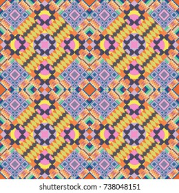 For textile, wallpaper, wrapping paper. Zigzag and stripe line, rhombus and tiles. Hand drawn seamless pattern. Vector tribal design in pink, orange and blue colors. Ethnic theme.