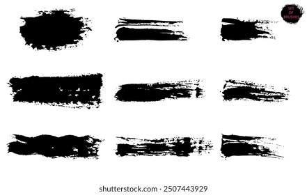 Textural brush strokes. A set of black paint strokes created for decoration, isolated on a white background.
