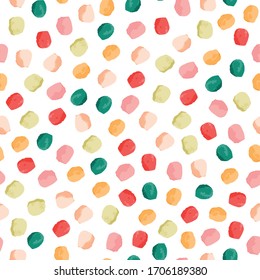 Textural dots vector seamless pattern. Girly seamless pattern. Pink, green, yellow, red circles on white background. Vector illustration. Surface pattern design for fabric, wallpaper, scrapbooking