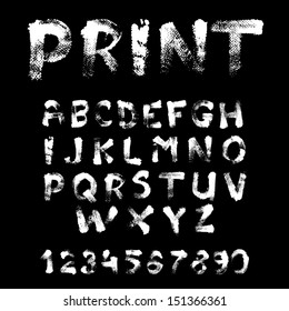 Texture font written with paint on black background