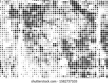 The texture of halftone. Abstract background of black dots on white