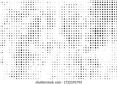 The texture of halftone. Abstract background of black dots on white