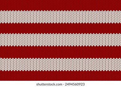 Texture of knitted fabric. Cozy knitting pattern in red and white horizontal stripes