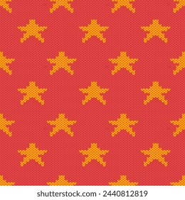 Texture of knitted fabric. Cozy orange and yellow star knitting pattern