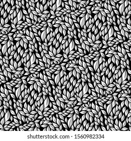 Texture of leaves of different size in white color on black background