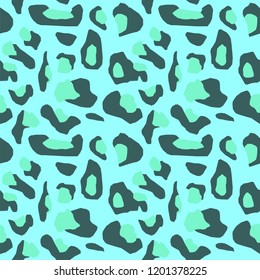 The texture of the leopard spots. Leopard pattern for textiles. Blue-black spots on a blue background.
