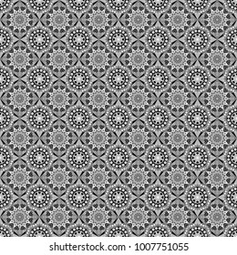 Texture, new background. Geometric stylized multicolored seamless pattern. Vector modern geometrical abstract background in gray, black and white colors.