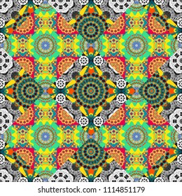 Texture, new background. Geometric stylized multicolored seamless pattern. Vector modern geometrical abstract background in yellow, gray and blue colors.