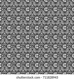 Texture, new background. Geometric stylized multicolored seamless pattern. Vector modern geometrical abstract background in white, black and gray colors.