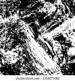 The texture of paint strokes with a dry brush. Grunge background black and white. Monochrome vintage surface in stains, dust and dirt. Gloomy pattern of scuffs, wear, cracks, chips
