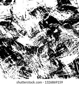 The texture of paint strokes with a dry brush. Grunge background black and white. Monochrome vintage surface in stains, dust and dirt. Gloomy pattern of scuffs, wear, cracks, chips