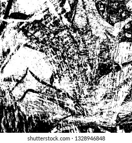 The texture of paint strokes with a dry brush. Grunge background black and white. Monochrome vintage surface in stains, dust and dirt. Gloomy pattern of scuffs, wear, cracks, chips