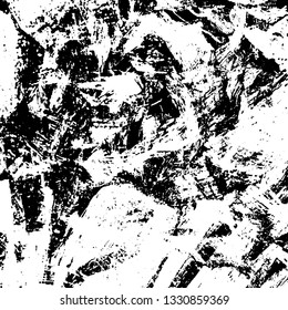 The texture of paint strokes with a dry brush. Grunge background black and white. Monochrome vintage surface in stains, dust and dirt. Gloomy pattern of scuffs, wear, cracks, chips
