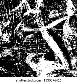 The texture of paint strokes with a dry brush. Grunge background black and white. Monochrome vintage surface in stains, dust and dirt. Gloomy pattern of scuffs, wear, cracks, chips