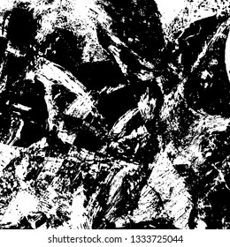 The texture of paint strokes with a dry brush. Grunge background black and white. Monochrome vintage surface in stains, dust and dirt. Gloomy pattern of scuffs, wear, cracks, chips