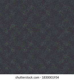 La textura de una materia textil que parece estar hecha de parches. Fondo texturado en morado oscuro y azul.