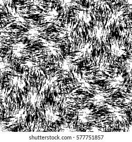 The texture is wavy soft fur. Seamless diamond shaped black and white pattern of the carpet.